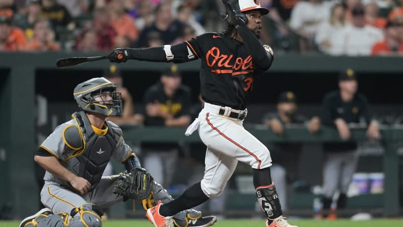 May 12, 2023; Baltimore, Maryland, USA; Baltimore Orioles center fielder Cedric Mullins (31) hits swings through a eighth inning three run homerun against the Pittsburgh Pirates  at Oriole Park at Camden Yards. Mandatory Credit: Tommy Gilligan-USA TODAY Sports
