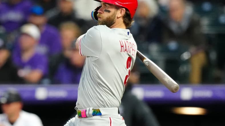 May 12, 2023; Denver, Colorado, USA; Philadelphia Phillies designated hitter Bryce Harper (3) doubles in the seventh inning against the Colorado Rockies at Coors Field. Mandatory Credit: Ron Chenoy-USA TODAY Sports
