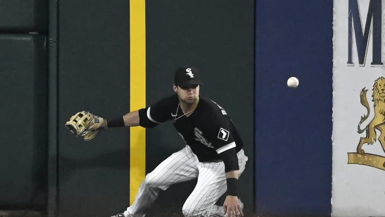 May 12, 2023; Chicago, Illinois, USA; Chicago White Sox left fielder Andrew Benintendi (23) can t make the play on the ball hit by Houston Astros right fielder Kyle Tucker (30) during the fifth inning at Guaranteed Rate Field. Mandatory Credit: Matt Marton-USA TODAY Sports