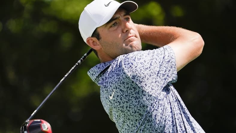 May 13, 2023; McKinney, Texas, USA; Scottie Scheffler plays his shot from the second tee during the third round of the AT&T Byron Nelson golf tournament. Mandatory Credit: Raymond Carlin III-USA TODAY Sports
