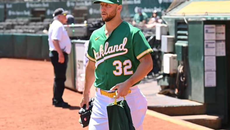 May 13, 2023; Oakland, California, USA; Oakland Athletics starting pitcher James Kaprielian (32) walks on the field before the game against the Texas Rangers at Oakland-Alameda County Coliseum. Mandatory Credit: Robert Edwards-USA TODAY Sports