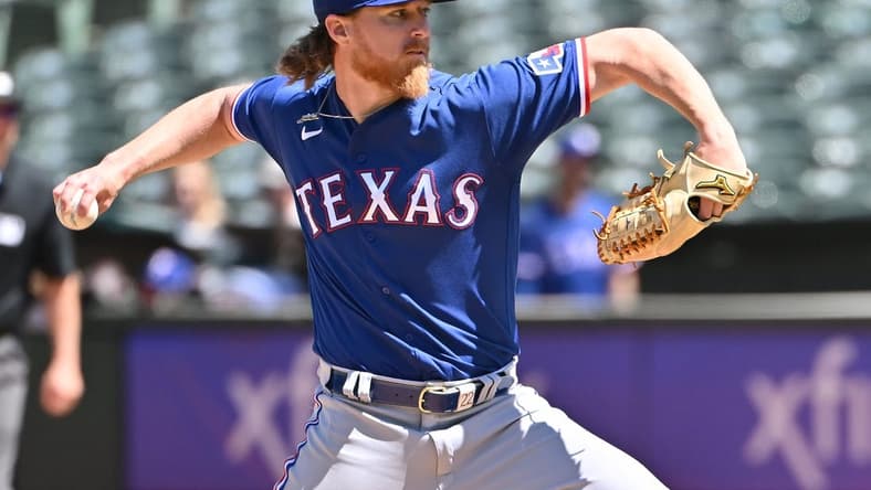 May 13, 2023; Oakland, California, USA; Texas Rangers starting pitcher Jon Gray (22) throws a pitch against the Oakland Athletics during the seventh inning at Oakland-Alameda County Coliseum. Mandatory Credit: Robert Edwards-USA TODAY Sports