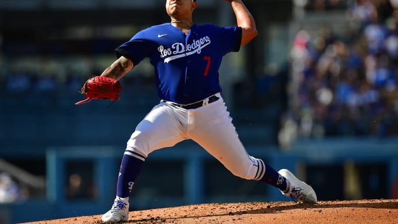 May 13, 2023; Los Angeles, California, USA; Los Angeles Dodgers starting pitcher Julio Urias (7) throws against the San Diego Padres during the second inning at Dodger Stadium. Mandatory Credit: Gary A. Vasquez-USA TODAY Sports