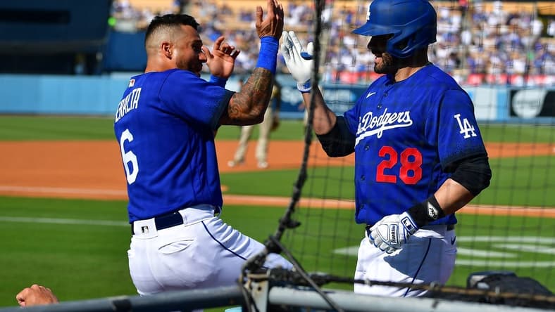May 13, 2023; Los Angeles, California, USA; Los Angeles Dodgers designated hitter J.D. Martinez (28) is greeted by left fielder David Peralta (6) after hitting a three run home run against the San Diego Padres during the first inning at Dodger Stadium. Mandatory Credit: Gary A. Vasquez-USA TODAY Sports