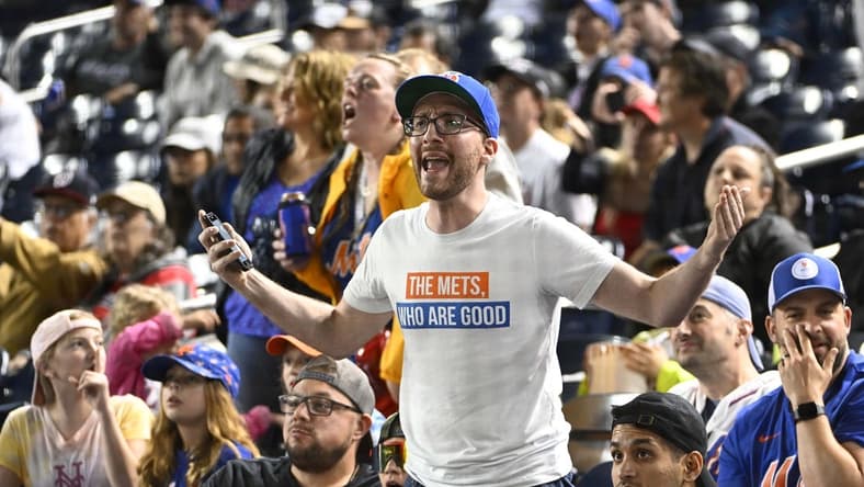 May 13, 2023; Washington, District of Columbia, USA; Fans react to the suspension of the game between the Washington Nationals and the New York Mets after an almost 4 hour delay at Nationals Park. Mandatory Credit: Brad Mills-USA TODAY Sports
