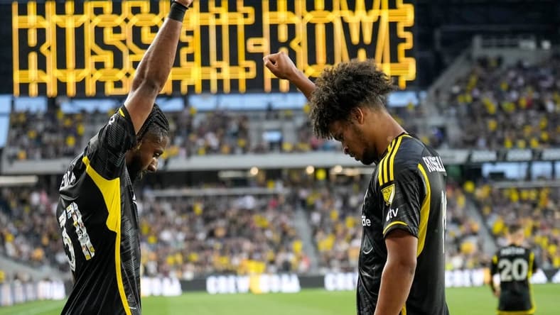 May 13, 2023; Columbus, Ohio, USA;  Columbus Crew forward Jacen Russell-Rowe (19) celebrates a goal with defender Steven Moreira (31) during the first half of the MLS soccer game between Columbus Crew and Orlando City at Lower.com Field.