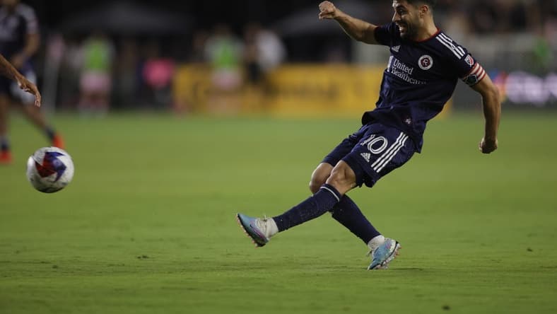 May 13, 2023; Fort Lauderdale, Florida, USA; New England Revolution midfielder Carles Gil (10) passes the ball during the game at DRV PNK Stadium. Mandatory Credit: Sam Navarro-USA TODAY Sports
