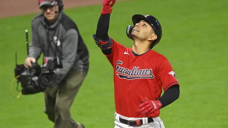 May 13, 2023; Cleveland, Ohio, USA; Cleveland Guardians second baseman Andres Gimenez (0) celebrates his solo home run in the eighth inning against the Los Angeles Angels at Progressive Field. Mandatory Credit: David Richard-USA TODAY Sports