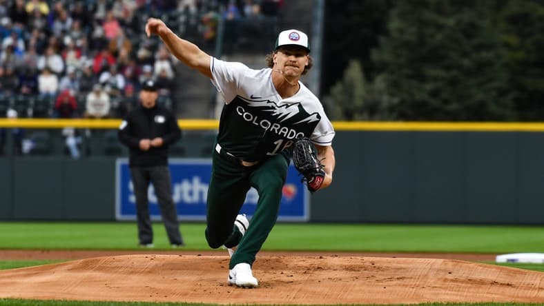 May 13, 2023; Denver, Colorado, USA; Colorado Rockies starting pitcher Ryan Feltner (18) delivers a pitch in the first inning against the Philadelphia Phillies at Coors Field. Mandatory Credit: John Leyba-USA TODAY Sports