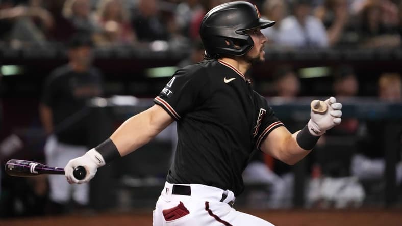 May 13, 2023; Phoenix, Arizona, USA; Arizona Diamondbacks right fielder Dominic Fletcher (8) hits a three RBI triple against the San Francisco Giants during the sixth inning at Chase Field. Mandatory Credit: Joe Camporeale-USA TODAY Sports