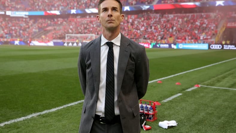 May 13, 2023; Harrison, New Jersey, USA; New York Red Bulls head coach Troy Lesesne stands for the national anthem before a game against New York City FC at Red Bull Arena. Mandatory Credit: Brad Penner-USA TODAY Sports