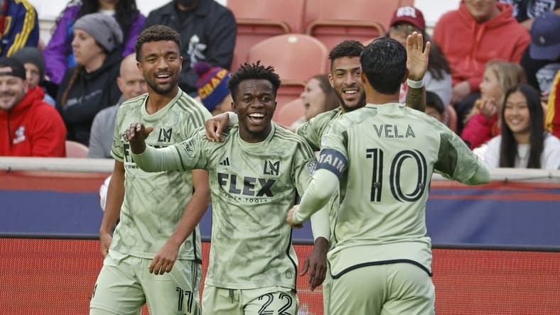 May 13, 2023; Sandy, Utah, USA; Los Angeles FC forward Kwadwo Opoku (22) is congratulated by forward Carlos Andres Gomez (11), forward Denis Bouanga (99) and forward Carlos Vela (10) after his first half goal against the Real Salt Lake at America First Field. Mandatory Credit: Jeff Swinger-USA TODAY Sports