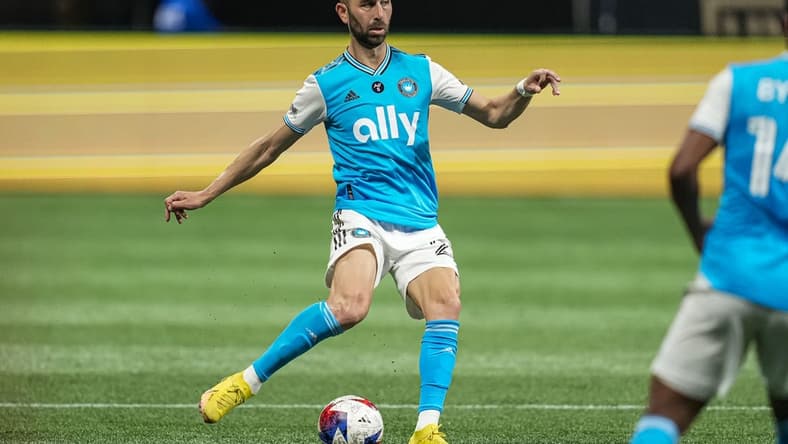 May 13, 2023; Atlanta, Georgia, USA; Charlotte FC midfielder Justin Meram (22) kicks the ball against Atlanta United at Mercedes-Benz Stadium. Mandatory Credit: Dale Zanine-USA TODAY Sports