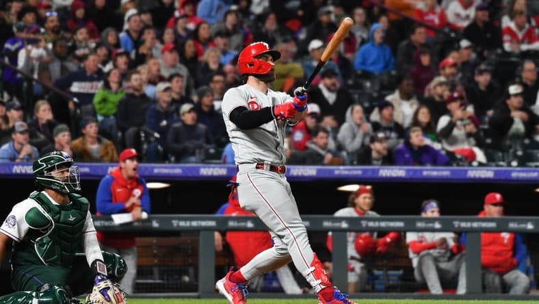 May 13, 2023; Denver, Colorado, USA; Philadelphia Phillies designated hitter Bryce Harper (3) hits a home run in the ninth inning against the Colorado Rockies at Coors Field. Mandatory Credit: John Leyba-USA TODAY Sports