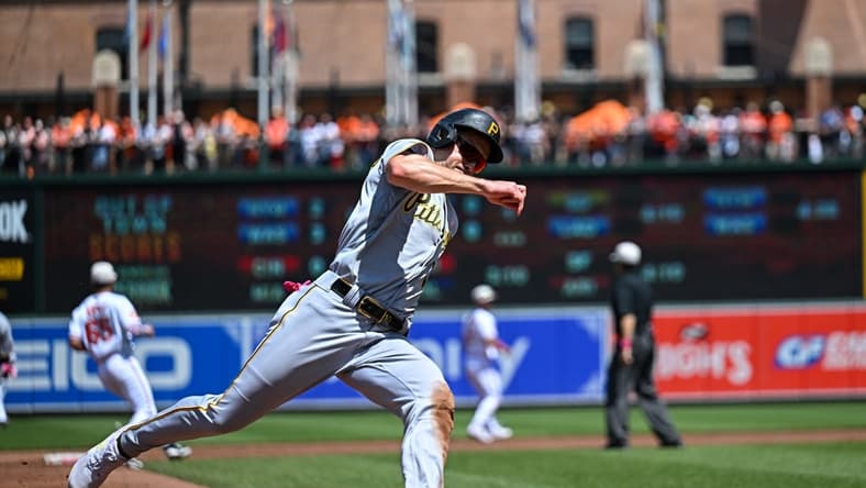 May 14, 2023; Baltimore, Maryland, USA; Pittsburgh Pirates left fielder Bryan Reynolds (10) rounds third base to score during the third inning against the Baltimore Orioles at Oriole Park at Camden Yards. Mandatory Credit: Reggie Hildred-USA TODAY Sports