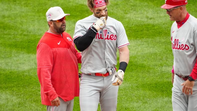 May 14, 2023; Denver, Colorado, USA; Philadelphia Phillies designated hitter Bryce Harper (3) following a scrum on the field in the seventh inning against the Colorado Rockies at Coors Field. Mandatory Credit: Ron Chenoy-USA TODAY Sports