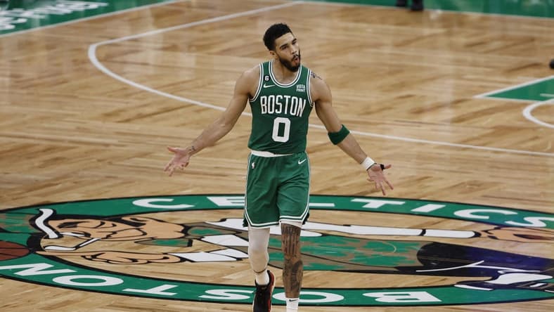 May 14, 2023; Boston, Massachusetts, USA; Boston Celtics forward Jayson Tatum (0) celebrates after making a three point basket against the Philadelphia 76ers during the second half of game seven of the 2023 NBA playoffs at TD Garden. Mandatory Credit: Winslow Townson-USA TODAY Sports