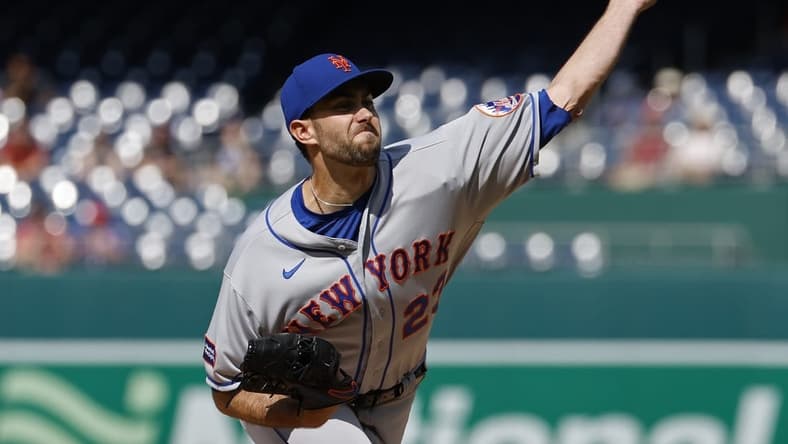 May 15, 2023; Washington, District of Columbia, USA; New York Mets starting pitcher David Peterson (23) pitches against the Washington Nationals during the first inning at Nationals Park. Mandatory Credit: Geoff Burke-USA TODAY Sports