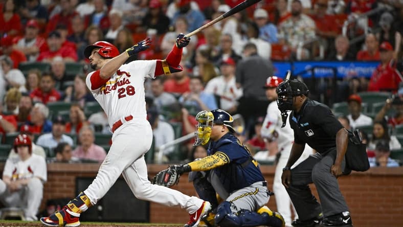May 15, 2023; St. Louis, Missouri, USA;  St. Louis Cardinals third baseman Nolan Arenado (28) hits a one run sacrifice fly against the Milwaukee Brewers during the sixth inning at Busch Stadium. Mandatory Credit: Jeff Curry-USA TODAY Sports