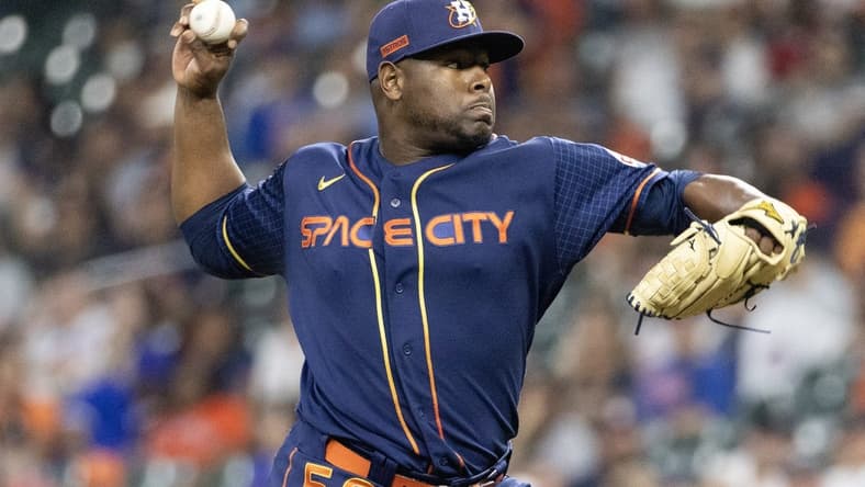 May 15, 2023; Houston, Texas, USA; Houston Astros relief pitcher Hector Neris (50) pitches against the Chicago Cubs in the ninth inning at Minute Maid Park. Mandatory Credit: Thomas Shea-USA TODAY Sports