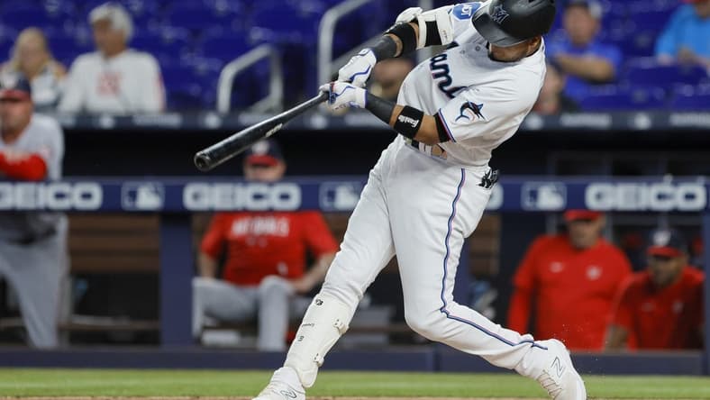 May 16, 2023; Miami, Florida, USA; Miami Marlins second baseman Luis Arraez (3) hits a double against the Washington Nationals during the first inning at loanDepot Park. Mandatory Credit: Sam Navarro-USA TODAY Sports