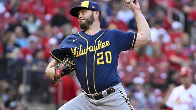May 16, 2023; St. Louis, Missouri, USA; Milwaukee Brewers starting pitcher Wade Miley (20) pitches against the St. Louis Cardinals during the first inning at Busch Stadium. Mandatory Credit: Jeff Curry-USA TODAY Sports