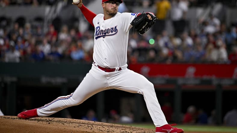 May 16, 2023; Arlington, Texas, USA; Texas Rangers starting pitcher Dane Dunning (33) pitches against the Atlanta Braves during the third inning at Globe Life Field. Mandatory Credit: Jerome Miron-USA TODAY Sports