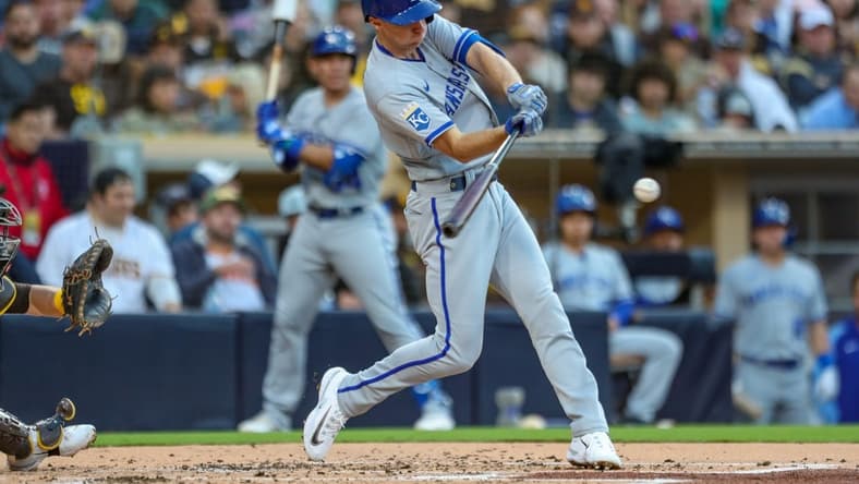 May 16, 2023; San Diego, California, USA; Kansas City Royals second baseman Matt Duffy (15) hits an RBI single against the San Diego Padres during the second inning at Petco Park. Mandatory Credit: David Frerker-USA TODAY Sports