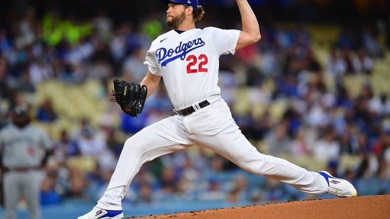 May 16, 2023; Los Angeles, California, USA; Los Angeles Dodgers starting pitcher Clayton Kershaw (22) throws against the Minnesota Twins during the second inning at Dodger Stadium. Mandatory Credit: Gary A. Vasquez-USA TODAY Sports