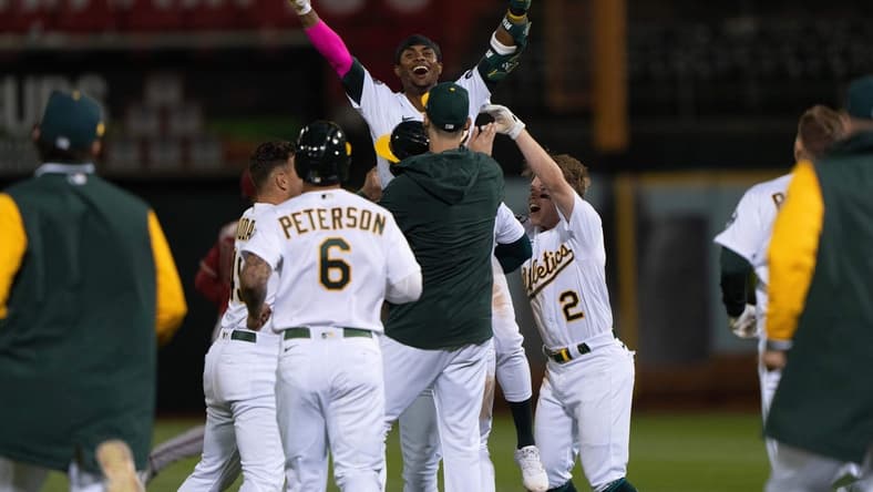 May 16, 2023; Oakland, California, USA; Oakland Athletics center fielder Esteury Ruiz (1) celebrates after hitting a walk off single to defeat the Arizona Diamondbacks at Oakland-Alameda County Coliseum. Mandatory Credit: Stan Szeto-USA TODAY Sports