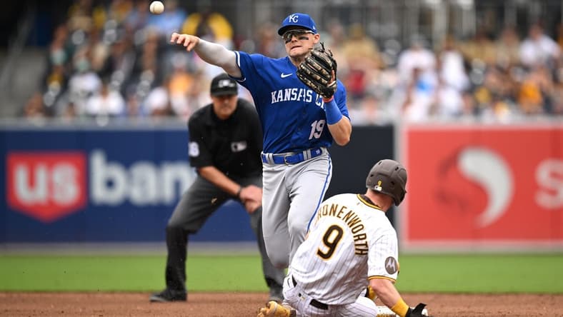 May 17, 2023; San Diego, California, USA; Kansas City Royals second baseman Michael Massey (19) throws to first base after forcing out San Diego Padres first baseman Jake Cronenworth (9) at second base to complete a double play during the third inning at Petco Park. Mandatory Credit: Orlando Ramirez-USA TODAY Sports