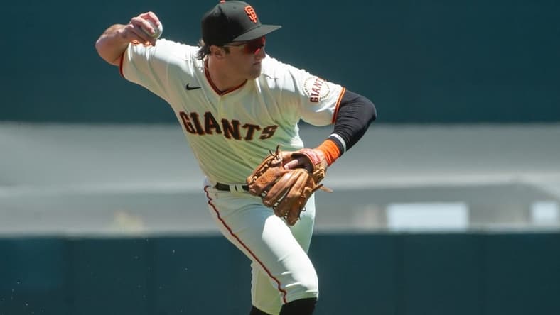 May 17, 2023; San Francisco, California, USA; San Francisco Giants third baseman Casey Schmitt (6) throws to first base during the first inning against the Philadelphia Phillies at Oracle Park. Mandatory Credit: Ed Szczepanski-USA TODAY Sports