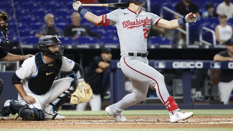 May 17, 2023; Miami, Florida, USA; Washington Nationals left fielder Corey Dickerson (23) hits a home run against the Miami Marlins during the second inning at loanDepot Park. Mandatory Credit: Rhona Wise-USA TODAY Sports