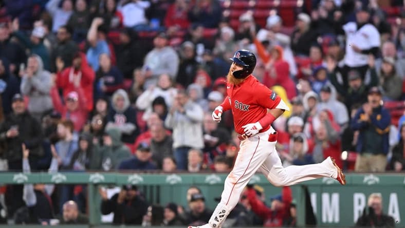 May 17, 2023; Boston, Massachusetts, USA; Boston Red Sox designated hitter Justin Turner (2) runs the bases after hitting a two run home run against the Seattle Mariners during the second inning at Fenway Park. Mandatory Credit: Brian Fluharty-USA TODAY Sports