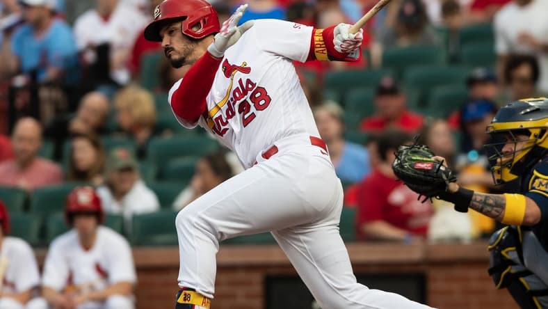 May 17, 2023; St. Louis, Missouri, USA; St. Louis Cardinals third baseman Nolan Arenado (28) gets an RBI-single in the first inning at Busch Stadium. Mandatory Credit: Paul Halfacre-USA TODAY Sports