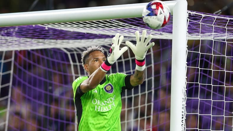 May 17, 2023; Orlando, Florida, USA; Orlando City SC goalkeeper Pedro Gallese (1) makes a save against New York City FC in the first half at Exploria Stadium. Mandatory Credit: Nathan Ray Seebeck-USA TODAY Sports