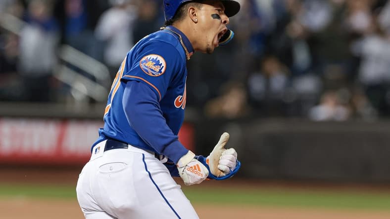 May 17, 2023; New York City, New York, USA; New York Mets third baseman Mark Vientos (27) reacts after hitting a two-run home run during the seventh inning against the Tampa Bay Rays at Citi Field. Mandatory Credit: Vincent Carchietta-USA TODAY Sports