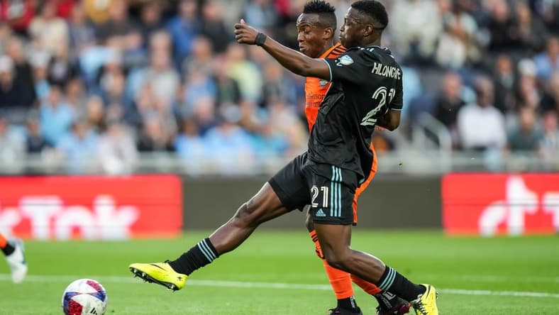 May 17, 2023; Saint Paul, Minnesota, USA; Minnesota United forward Bongokuhle Hlongwane (21) shoots during the first half against Houston Dynamo at Allianz Field. Mandatory Credit: Brace Hemmelgarn-USA TODAY Sports