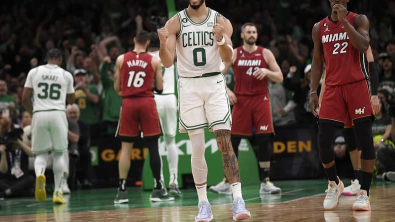 May 17, 2023; Boston, Massachusetts, USA; Boston Celtics forward Jayson Tatum (0) reacts after a play during the first half against the Miami Heat in game one of the Eastern Conference Finals for the 2023 NBA playoffs at TD Garden. Mandatory Credit: Bob DeChiara-USA TODAY Sports