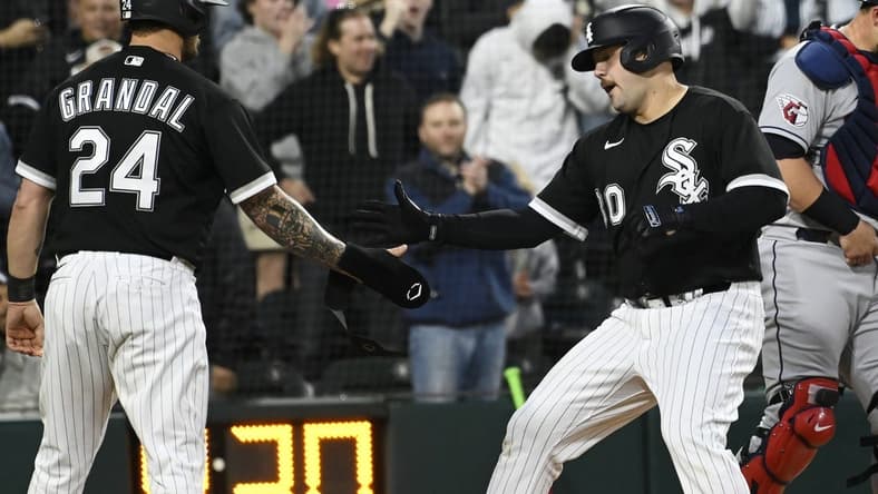May 17, 2023; Chicago, Illinois, USA; Chicago White Sox third baseman Jake Burger (30) celebrates with Chicago White Sox catcher Yasmani Grandal (24) after he hits a two-run home run against the Cleveland Guardians during the fourth inning at Guaranteed Rate Field. Mandatory Credit: Matt Marton-USA TODAY Sports