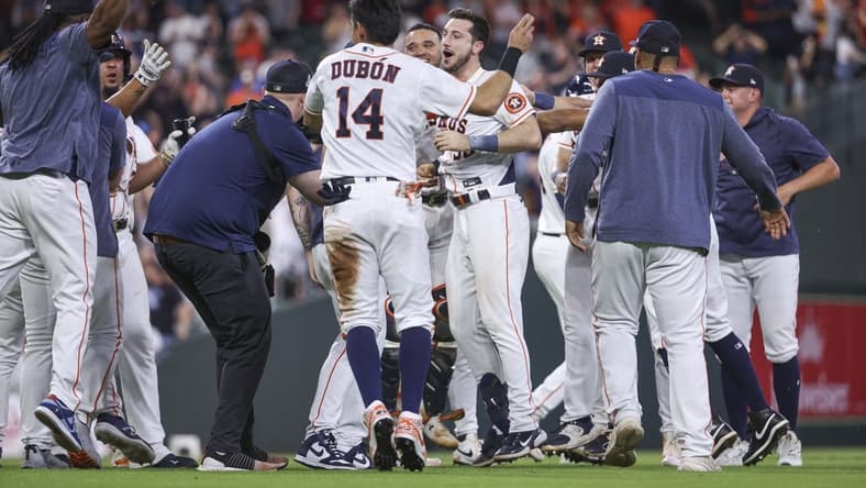 May 17, 2023; Houston, Texas, USA; Houston Astros designated hitter Kyle Tucker (30) celebrates with teammates after hitting a game-winning walk-off single during the ninth inning against the Chicago Cubs at Minute Maid Park. Mandatory Credit: Troy Taormina-USA TODAY Sports