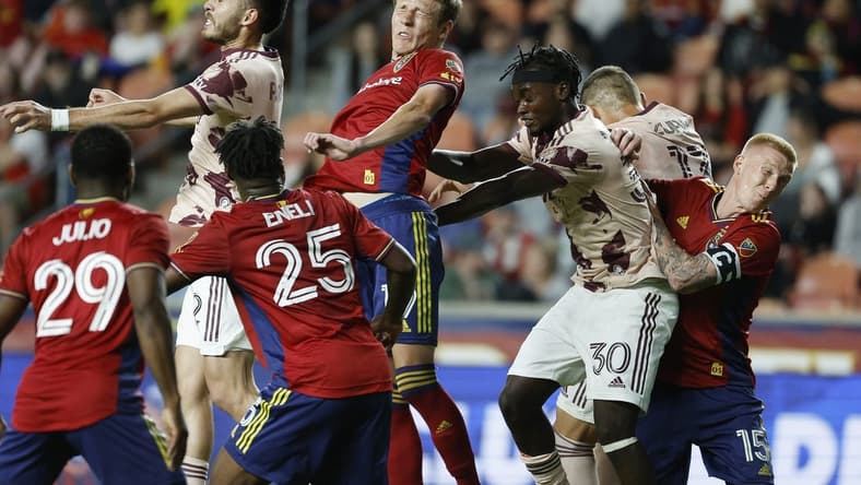 May 17, 2023; Sandy, Utah, USA; Real Salt Lake midfielder Bode Hidalgo (19) and Portland Timbers midfielder Santiago Moreno (30) battle for the ball at America First Field. Mandatory Credit: Jeff Swinger-USA TODAY Sports