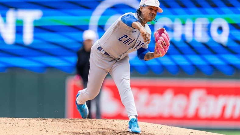 May 14, 2023; Minneapolis, Minnesota, USA; Chicago Cubs starting pitcher Marcus Stroman (0) pitches to Minnesota Twins second baseman Nick Gordon (1) in the third inning at Target Field. Mandatory Credit: Matt Blewett-USA TODAY Sports