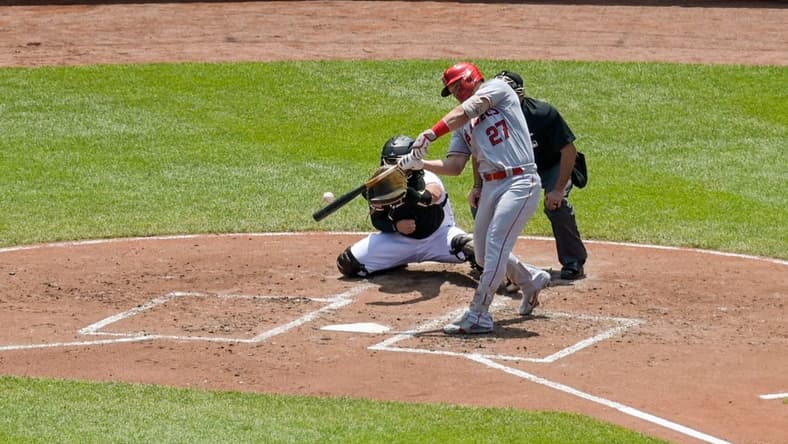 May 18, 2023; Baltimore, Maryland, USA;  Los Angeles Angels center fielder Mike Trout (27) hits a solo home run to center field during the third inning against the Baltimore Orioles at Oriole Park at Camden Yards. Mandatory Credit: Tommy Gilligan-USA TODAY Sports