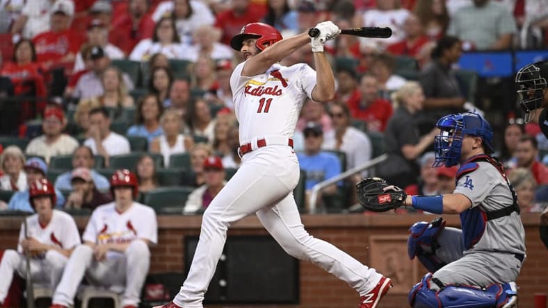May 18, 2023; St. Louis, Missouri, USA; St. Louis Cardinals shortstop Paul DeJong (11) hits a solo home run against the Los Angeles Dodgers in the third inning at Busch Stadium. Mandatory Credit: Joe Puetz-USA TODAY Sports