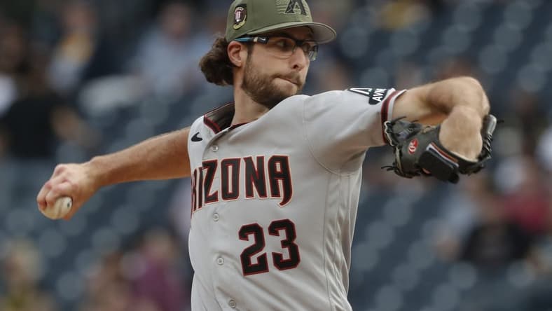 May 19, 2023; Pittsburgh, Pennsylvania, USA; Arizona Diamondbacks starting pitcher Zac Gallen (23) delivers a pitch against the Pittsburgh Pirates during the first inning at PNC Park. Mandatory Credit: Charles LeClaire-USA TODAY Sports