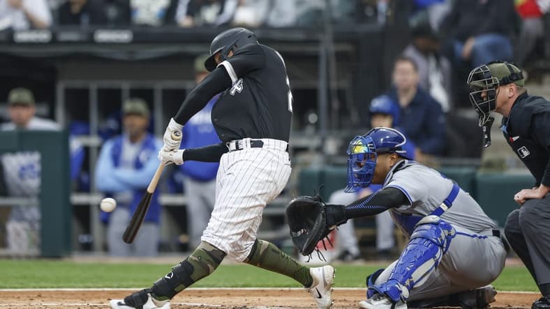 May 19, 2023; Chicago, Illinois, USA; Chicago White Sox first baseman Andrew Vaughn (25) singles against the Kansas City Royals during the second inning at Guaranteed Rate Field. Mandatory Credit: Kamil Krzaczynski-USA TODAY Sports