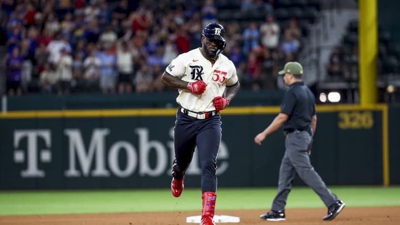 May 19, 2023; Arlington, Texas, USA; TTexas Rangers right fielder Adolis Garcia (53) runs the bases after hitting a two-run home run during the fourth inning against the Colorado Rockies at Globe Life Field. Mandatory Credit: Kevin Jairaj-USA TODAY Sports