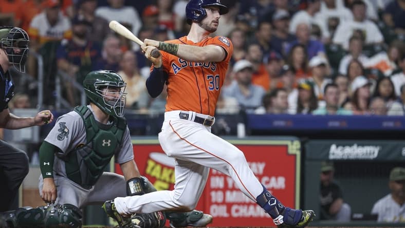 May 19, 2023; Houston, Texas, USA; Houston Astros right fielder Kyle Tucker (30) hits an RBI double during the fourth inning against the Oakland Athletics at Minute Maid Park. Mandatory Credit: Troy Taormina-USA TODAY Sports