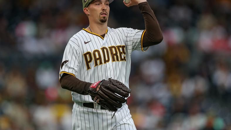 May 19, 2023; San Diego, California, USA; San Diego Padres starting pitcher Blake Snell (4) throws to first base for the final out of the first inning against the Boston Red Sox at Petco Park. Mandatory Credit: David Frerker-USA TODAY Sports